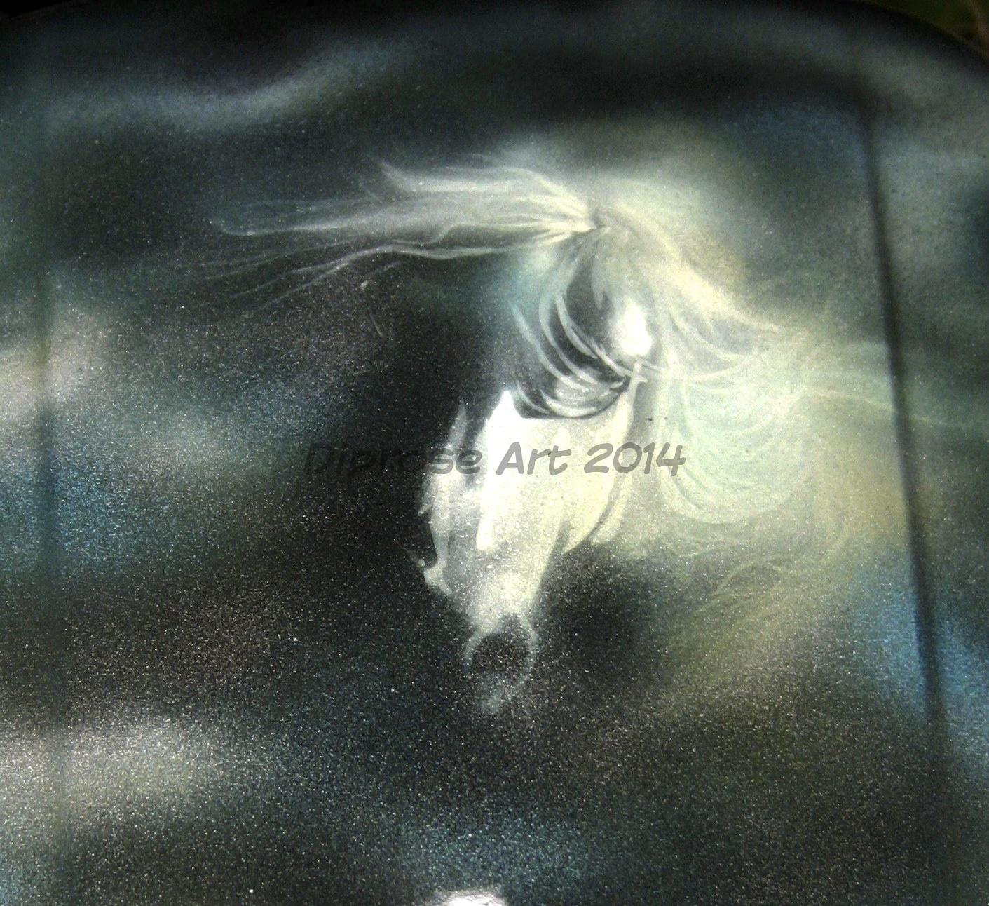Automotive customisation - Strombringer Bike - top of tank -  ghostly grey horse who&#039;s mane is being whipped by a storm - shown after lacquer which brings out metallics